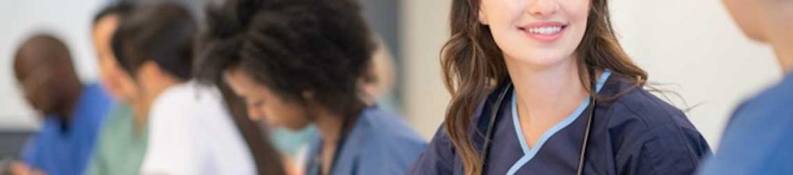 Nursing students studying together at a table